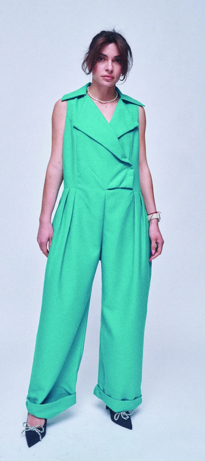 Draped emerald green wide-leg jumpsuit